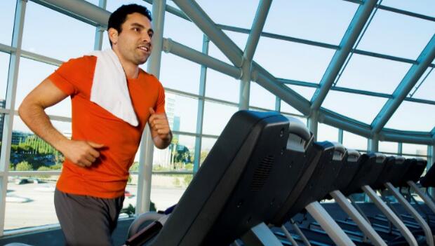 Man Exercising On Treadmill