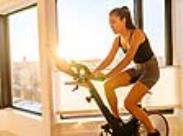woman on a stationary bike-front