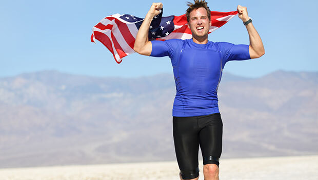 man running with flag
