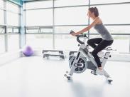 woman-riding-a-stationary-bike-front