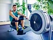 man on a rowing machine-front