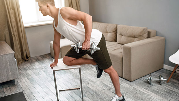 man-doing-a-dumbbell-row-at-home