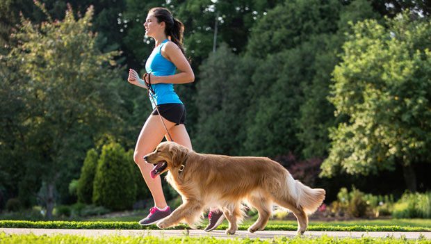 woman running with a dog