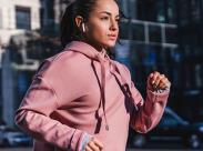woman-running-with-earbuds-front