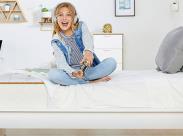girl-playing-video-games-on-a-bed