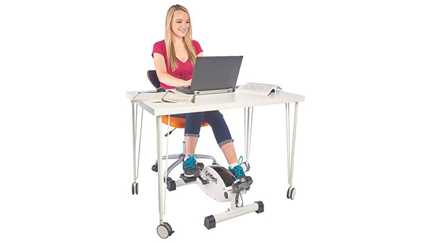 woman-using-an-under-desk-elliptical-carousel