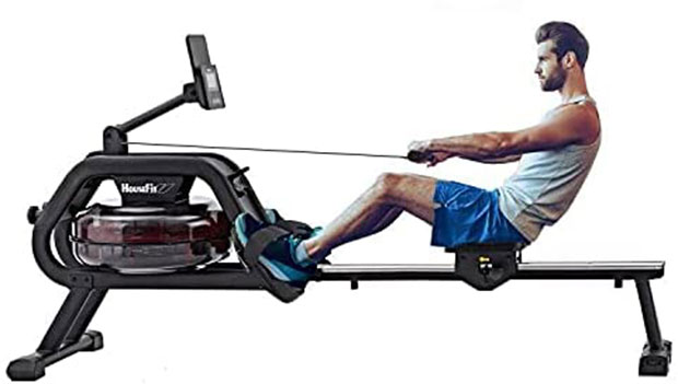 man using a water rower