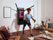 woman-using-a-workout-mirror