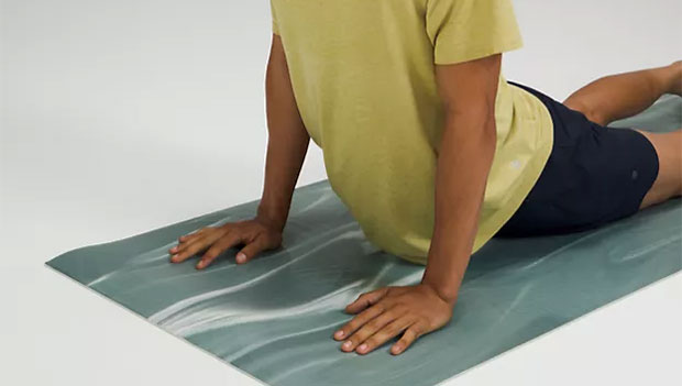 Person using a yoga man