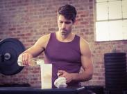 man-pouring-water-into-a-blender-bottle