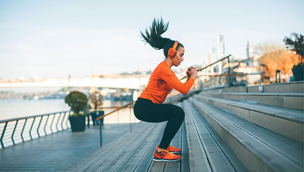 woman-doing-box-jumps-on-outdoor-stairs