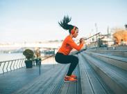 woman-doing-box-jumps-on-outdoor-stairs-front