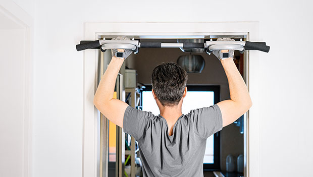 man performing pull-up