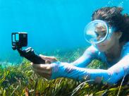 woman-using-a-gopro-hero9-camera-underwater
