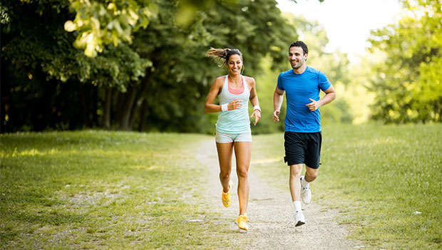 man-and-woman-jogging-on-a-trail