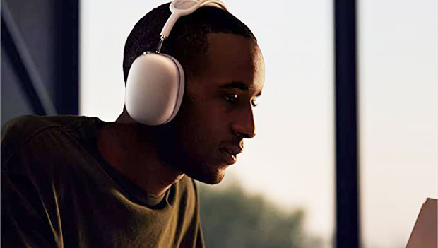 man wearing apple headphones