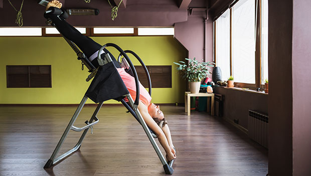 woman using inversion table