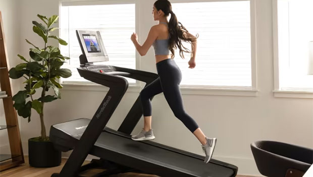 woman running on treadmilll