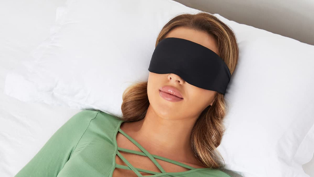 woman sleeping with sleep mask