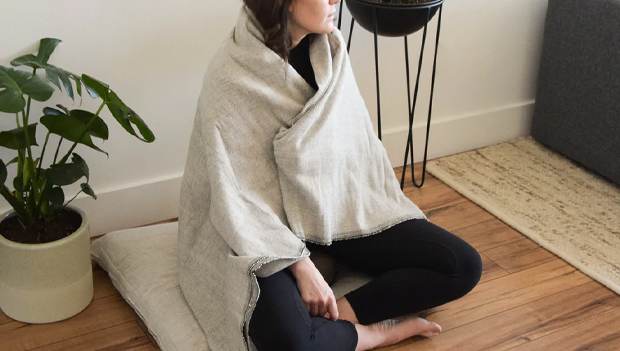 Woman using a yoga blanket