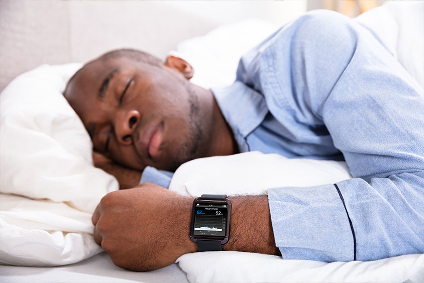 Man resting with fitness tracker