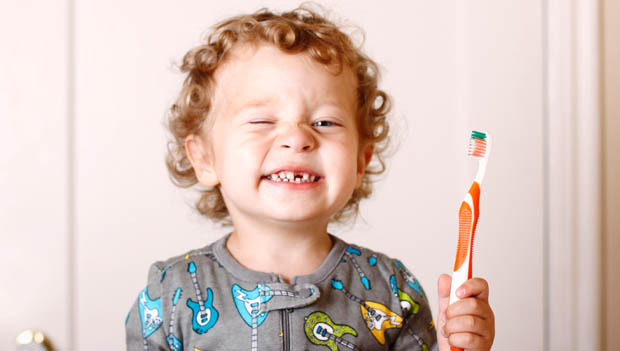 Child with Toothbrush