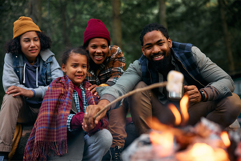 Family Around A Fire