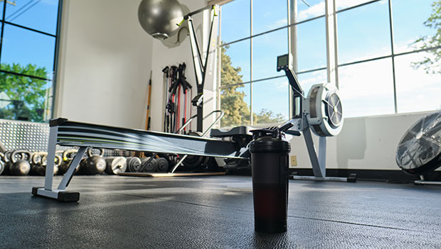 empty gym with protein shake