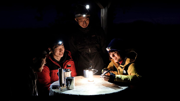 Family wearing headlamps