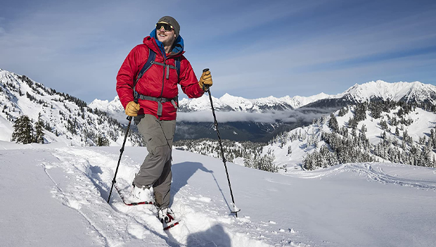 Man hiking in snow shoes