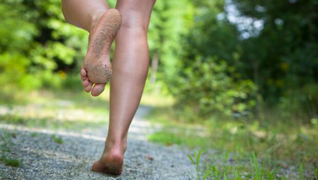 girl running barefoot