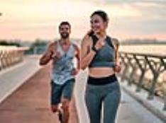 Man+and+woman+running+at+sunrise front