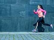 article image of woman running in pink