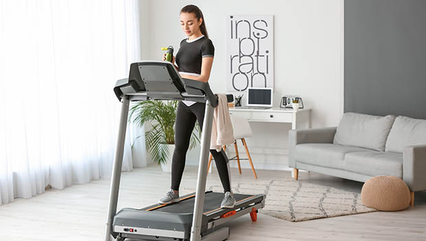 woman on a treadmill at home
